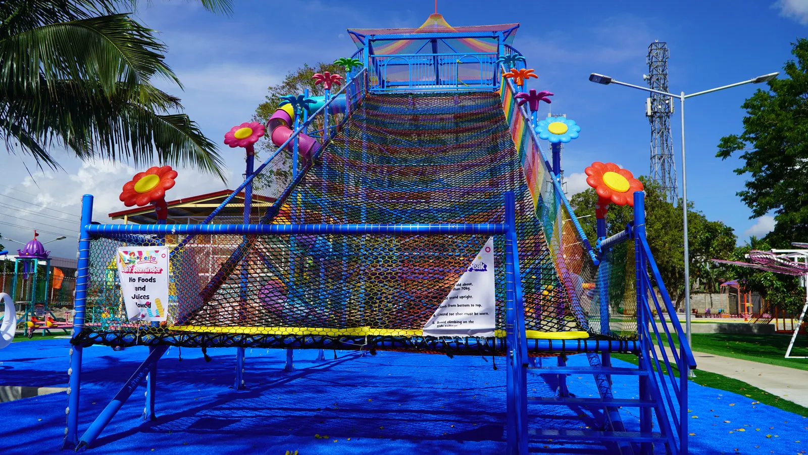 Tall colorful climbing net tower